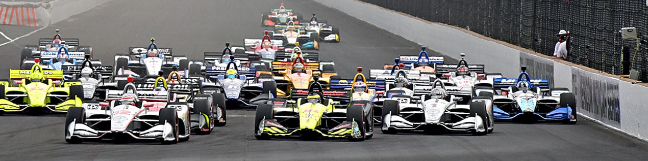 indy cars racing to through the start line Cincinnati