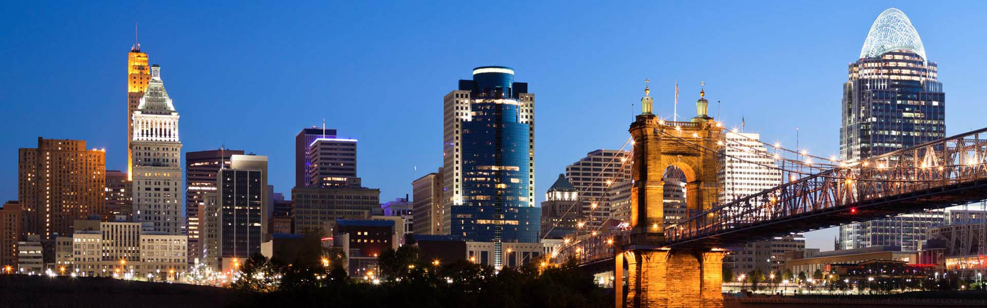 Neon color image of a band playing and people singing along